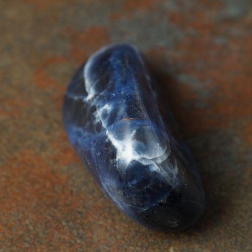 Raw Sodalite crystal metaphysical properties, meanings, uses, benefits, healing energies, chakras