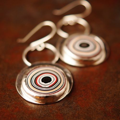 Handcrafted sterling silver bezel set round Fordite earrings 