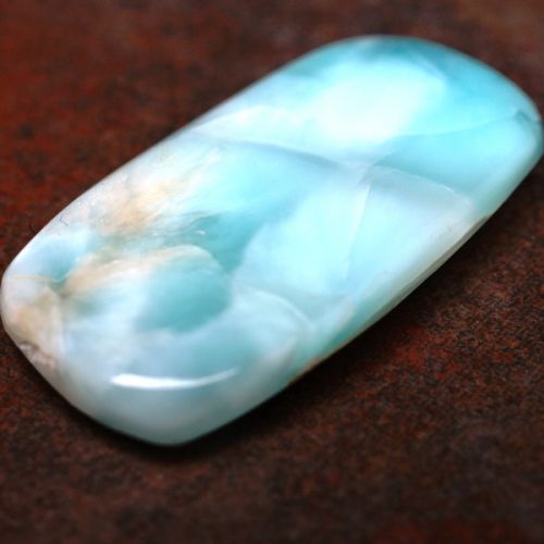 Raw Larimar crystal metaphysical properties, meanings, uses, benefits, healing energies, chakras