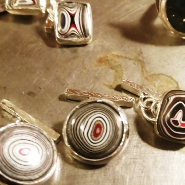 Commission handcrafted fine and sterling silver bezel set Fordite cufflinks