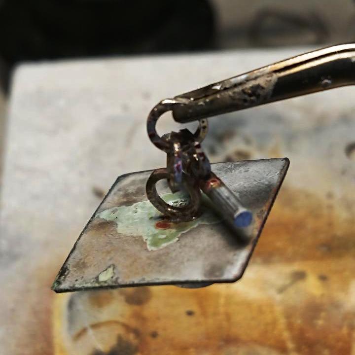 Handmade sterling silver bezel set amber cufflinks soldering the chain of the cufflink