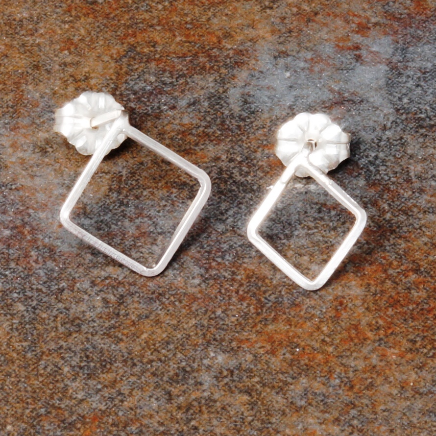 Handmade Asymmetric sterling silver diamond studs