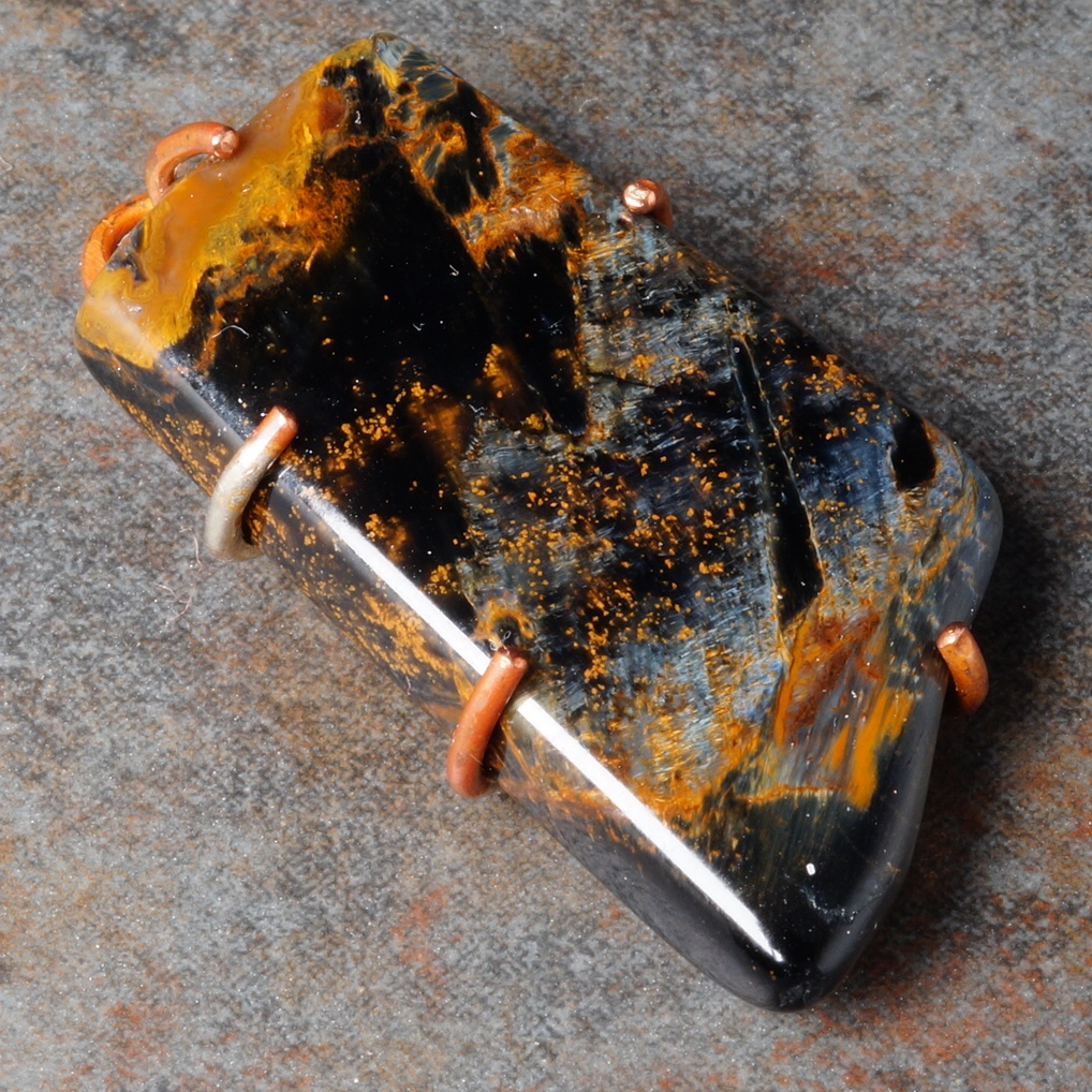 Pietersite copper wire prong set pendant