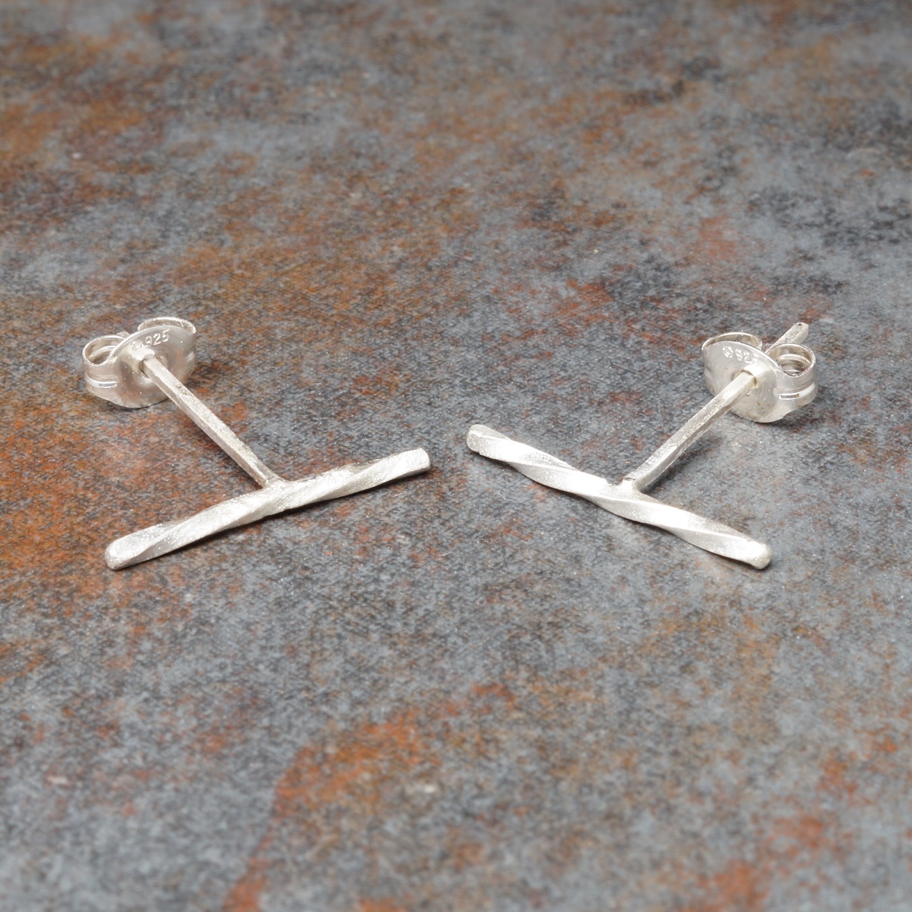 Handmade small sterling silver twisted bar studs