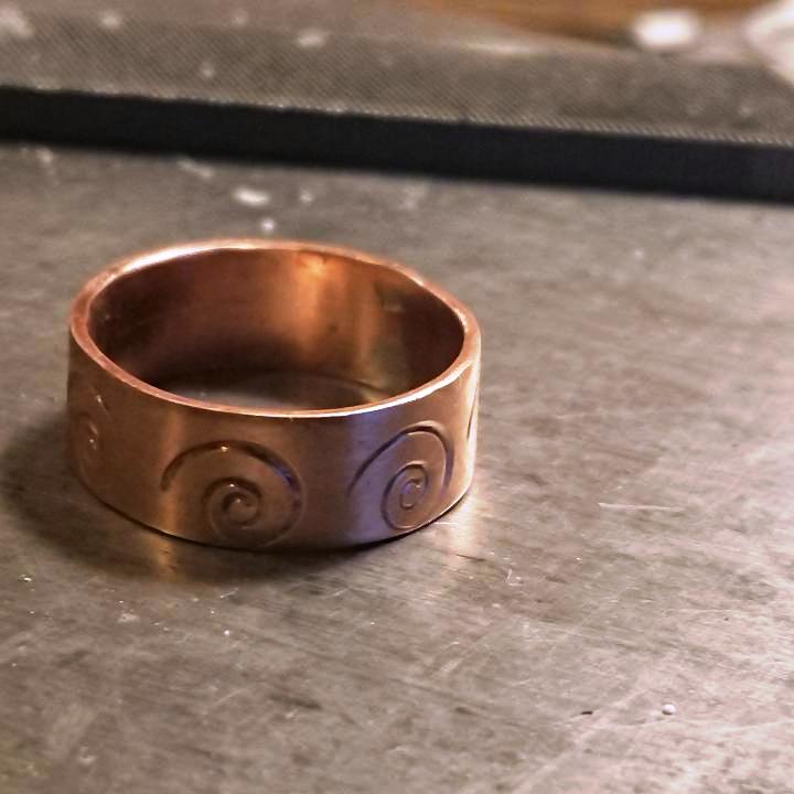 Final handmade spiral stamped copper ring for right hand wedding finger