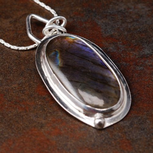 Hadncraftted fine and sterling silver bezel set elongated oval purple labradorite pendant