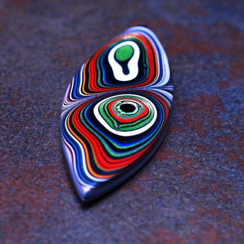 Opaques and Metallics Pitted Fordite