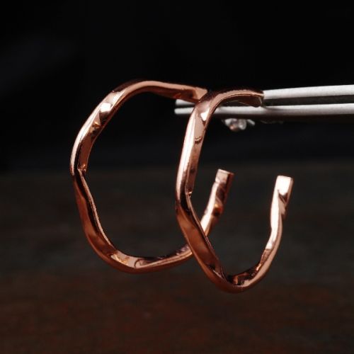 Handcrafted minimalist contemporary copper flow hoops with sterling silver earposts perfect for ever