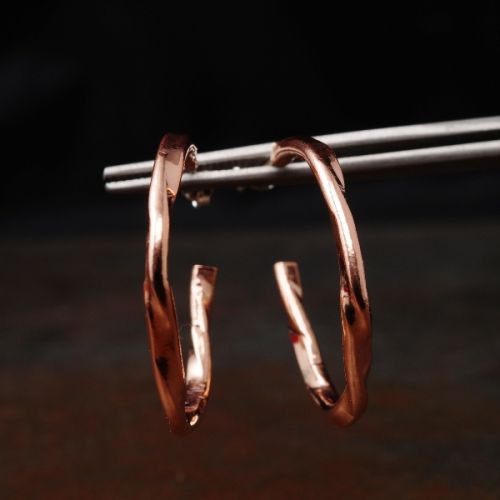 Handcrafted minimalist contemporary copper flow hoops with sterling silver earposts perfect for ever