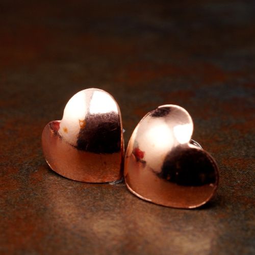 Handcrafted recycled domed copper heart studs with sterling silver earposts and backs