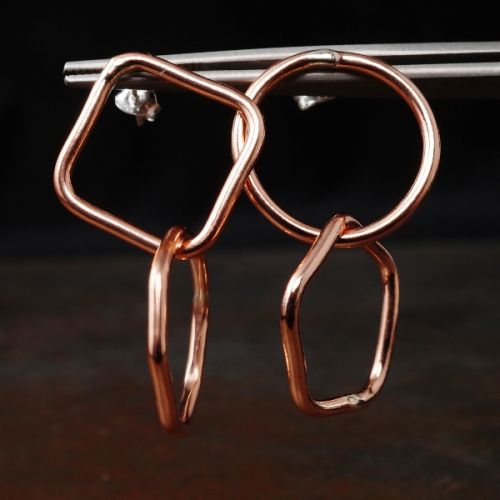 Handcrafted large contemporary asymmetric geometric recycled copper wire studs with sterling silver 