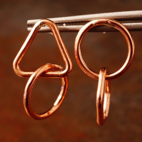 Handcrafted small asymmetric geometric recycled copper wire studs with sterling silver earposts 
