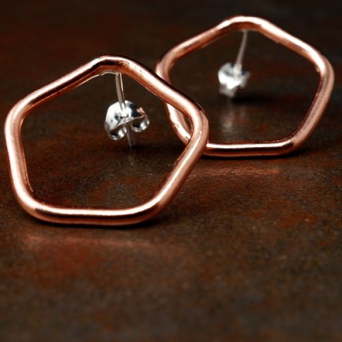 Handcrafted pentagonal recycled copper wire studs with sterling silver earposts and scrolls