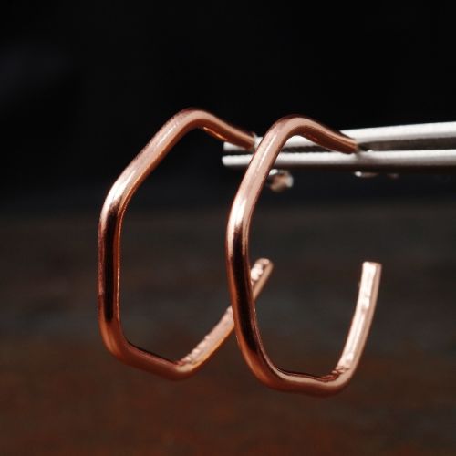 Handcrafted minimalist contemporary hexagonal flow hoops with sterling silver earposts perfect for e