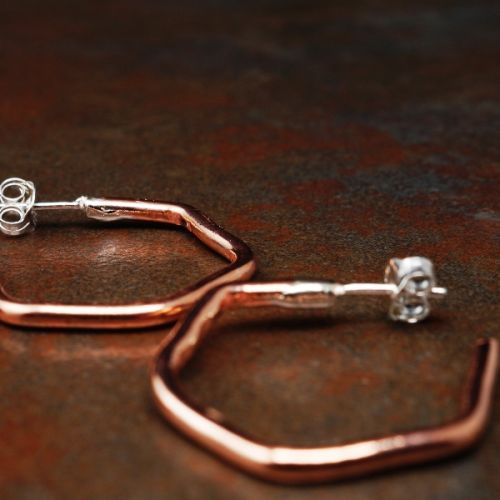 Handcrafted minimalist contemporary hexagonal flow hoops with sterling silver earposts perfect for e