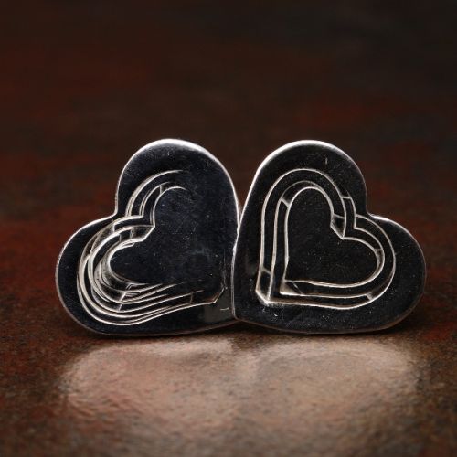 Handcrafted recycled sterling silver stamped heart studs with sterling silver earposts and backs