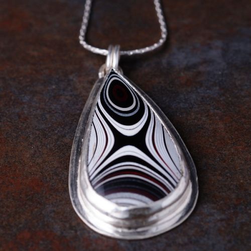 Handcrafted sterling silver teardrop Fordite  pendant 01