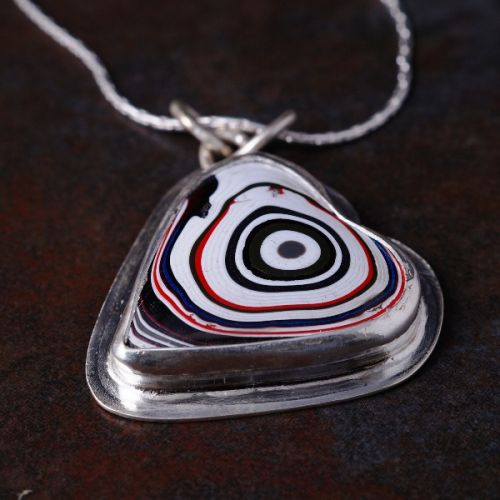 Handcrafted sterling silver heart Fordite  pendant 01