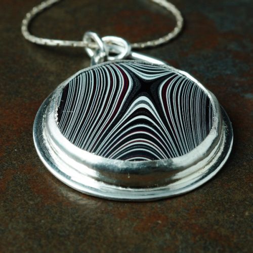 Handcrafted Round Fordite Sterling Silver Cut out Pendant 01